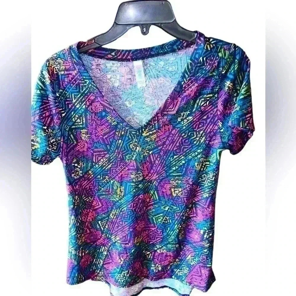 Lularoe XSV Neck navy floral Christy‎ T-shirt. NWT . Pattern on pattern .
